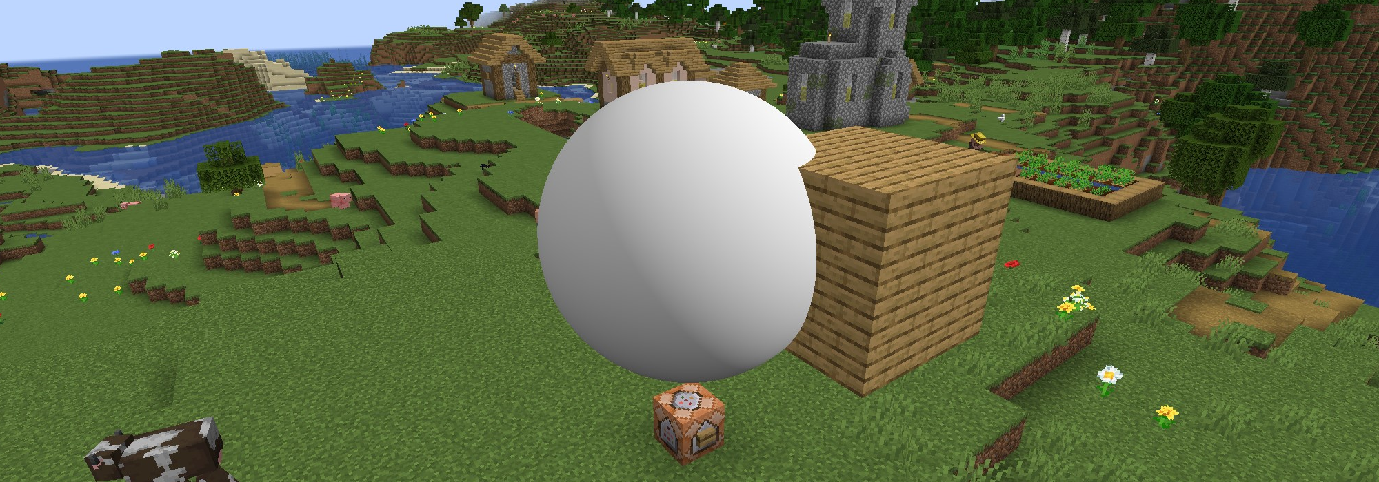 a Minecraft world with a sphere in the foreground